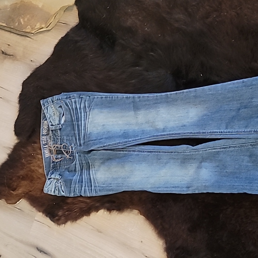 Western bell bottom jeans. Tie in the front